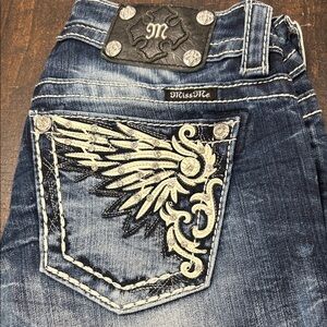 Miss Me Blue Jeans with Wing Embroidery.size 27/32 inseam